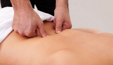 Massage for pain at the lower back of the back
